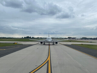 Fototapeta na wymiar Airplane on the runway