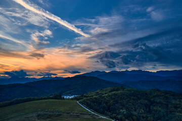 Evening panoramic view of mount with beautiful sky. Sunset in mountains