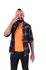 Happy young man wiping his tears and laughing