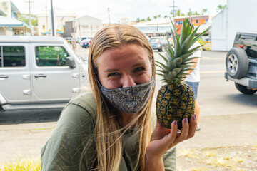 Woman with a little pineapple