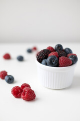 Fresh summer berries on white background