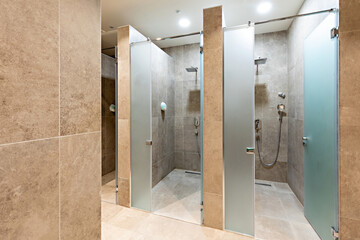 Public gym showers in hotel wellness
