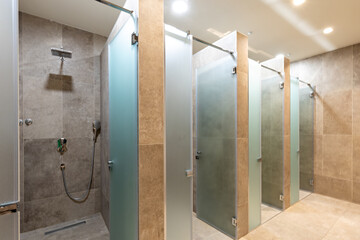 Public gym showers in hotel wellness