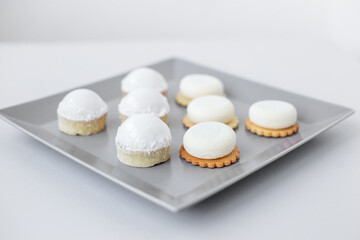 Tartlets on a stylish gray plate in a restaurant, on-site catering, a delicious and stylish dessert
