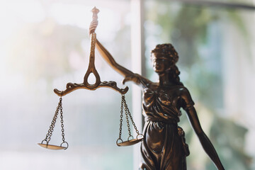 Business and lawyers discussing contract papers with brass scale on desk in office. Law, legal...