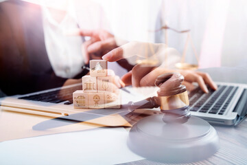 Business and lawyers discussing contract papers with brass scale on desk in office. Law, legal services, advice, justice and law concept picture with film grain effect