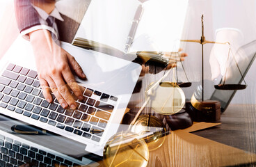 Business and lawyers discussing contract papers with brass scale on desk in office. Law, legal services, advice, justice and law concept picture with film grain effect