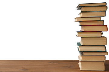 Stack of books on wooden table against white background. Library material