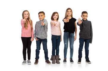 Obraz premium Kids: Group Of Children Point At Camera