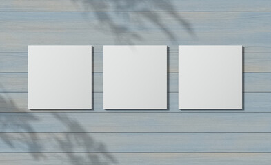 Three white squares on wood textured wall. Triptych. 3D render. White square mock up. Empty interior. 3D illustrations. 3D design interior. Template for business. Shadow on the wall. Empty blank. - obrazy, fototapety, plakaty