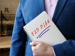 Business concept meaning 529 PLAN with phrase on the piece of paper.