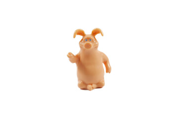 Figurine of a cheerful pig on a white background