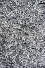 Tool marks in stone, left as part of the process to hand carve stone blocks
