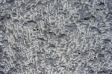 Tool marks in stone, left as part of the process to hand carve stone blocks
