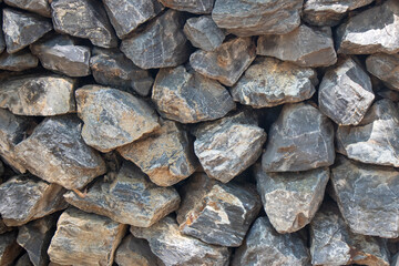 The stones are stacked in groups in the background wall and textures.