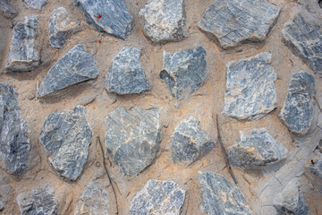 Stones lined in cement, wallpapers and textures.