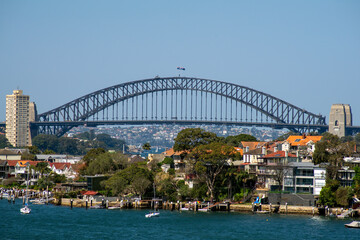 Fototapeta premium View of Sydney Harbour Bridge with residential suburb in foreground, Sydney, NSW, Australia