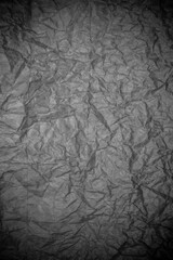Naklejka premium Black crumpled paper texture.