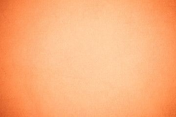 Textured recycling paper orange background.