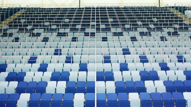 Spacious sports hall with empty bleachers