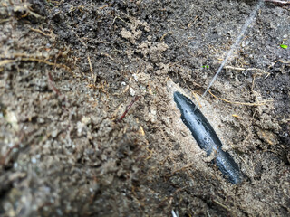 A 25mm pipe poly planted in the ground had a small leak.