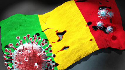 Covid in Mali - coronavirus attacking a national flag of Mali as a symbol of a fight and struggle with the virus pandemic in this country, 3d illustration