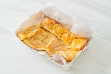 roti with egg and sweetened condensed milk
