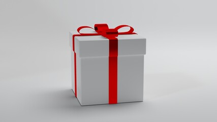White gift box with red ribbon.