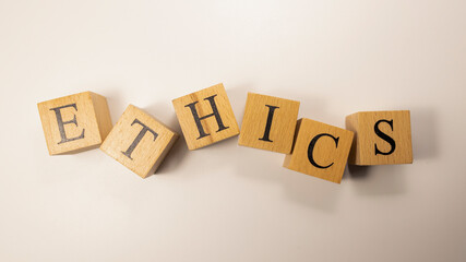 The word Ethics was created from wooden cubes. Rules and morals.