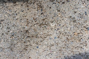 Close up abstract industrial background and Cracked beautyful texture with deep pores of cement or Plaster, cast material or Smooth plastered stone