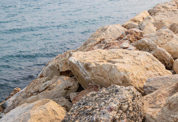 stones on the background of the sea as a background