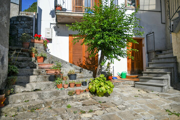 Fototapeta na wymiar A street in the historic center of Castelsaraceno, a old town in the Basilicata region, Italy. 