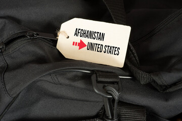 Eine Tasche und Reise vom Afghanistan in die USA