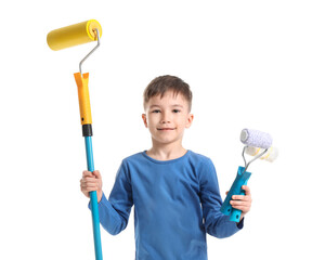 Little boy with paint rollers on white background