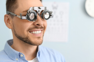 Man visiting ophthalmologist in clinic