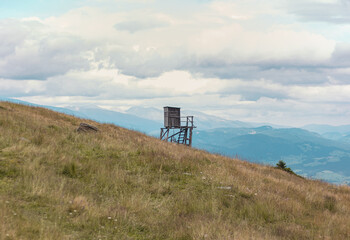 hunting stand on top of mountain far away