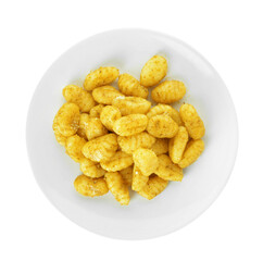 Plate with tasty pesto gnocchi on white background
