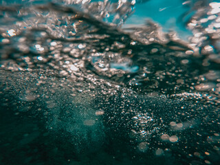 Underwater photo of deep see with bubbles and for bacground