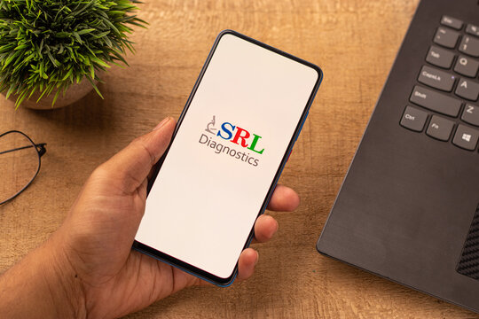 Assam, india - April 10, 2021 : SRL Diagnostics logo on phone screen stock image.