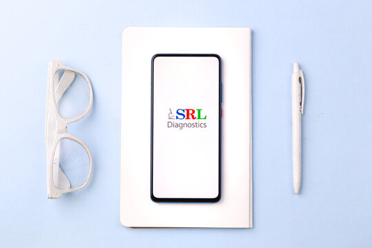 Assam, india - April 10, 2021 : SRL Diagnostics logo on phone screen stock image.