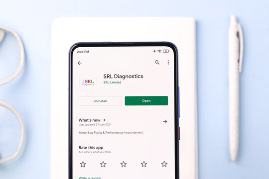 Assam, india - April 10, 2021 : SRL Diagnostics logo on phone screen stock image.
