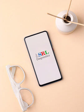 Assam, india - April 10, 2021 : SRL Diagnostics logo on phone screen stock image.