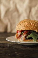 juicy burger on a wooden background