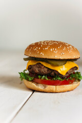 juicy burger on a wooden background