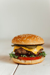 juicy burger on a wooden background