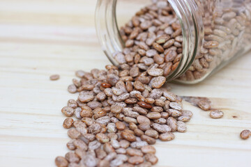 Jar of Pinto Beans Spilled on Kitchen Table