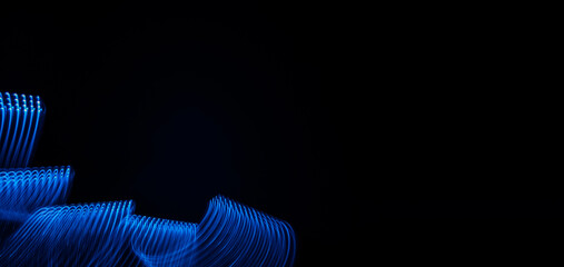 Beautiful graphic spiral blue light shapes on black background. Graphic background picture