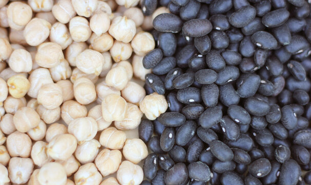 Spilled Black Beans and Chickpeas Close up Background