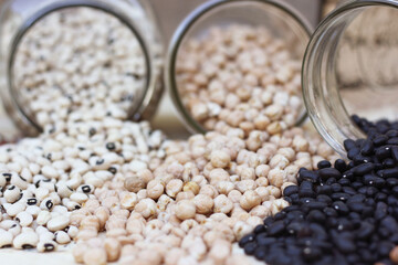 Jars of Black-eyed Peas, Chick Peas, Black Beans and Pinto Beans Spilled in Kitchen