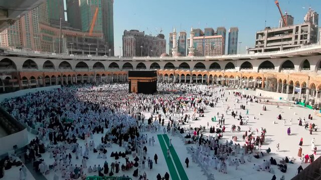 MECCA, SAUDI ARABIA - September 10, 2019: Video of unidentified pilgrims perform Tawaf around Kaaba inside Masjidil Haram, Makkah